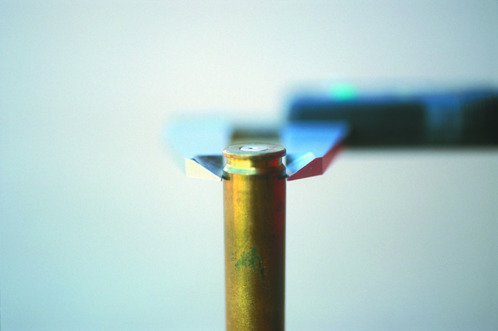 Case head expansion should be checked using calipers that are capable of measuring 0.0001 inch. High-pressure rifle cartridges usually expand .0003 to .0005 inch and are generally considered to be around 50,000 CUP.